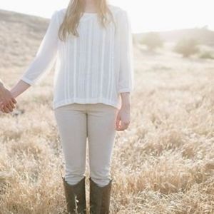 Lush size medium sheer cream top with lace details and button back closure